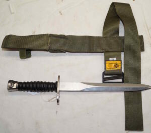 Swiss STG57 bayonet with scabbard and Iraqi made MOLLE web rig.