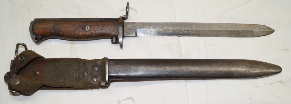 M1956 bayonet with scabbard and integral frog.