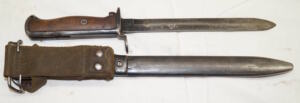 M1956 bayonet with scabbard and integral frog.