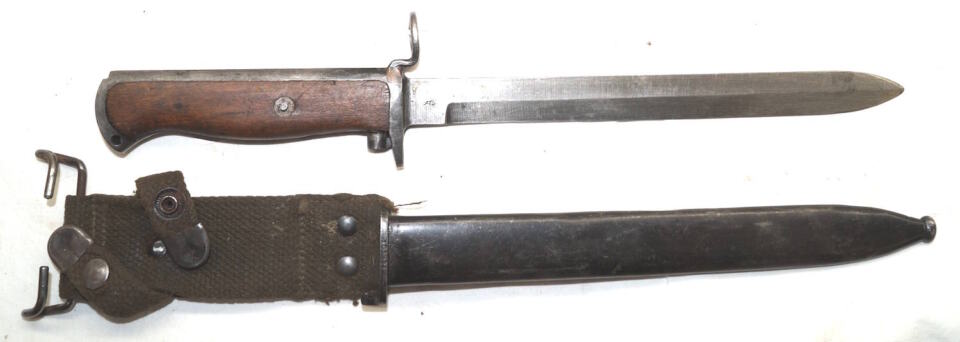 M1956 bayonet with scabbard and integral frog.