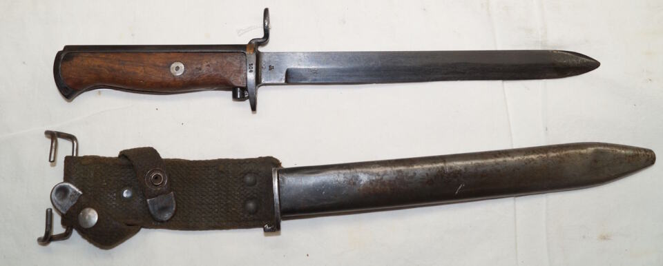 M1956 bayonet with scabbard and integral frog.