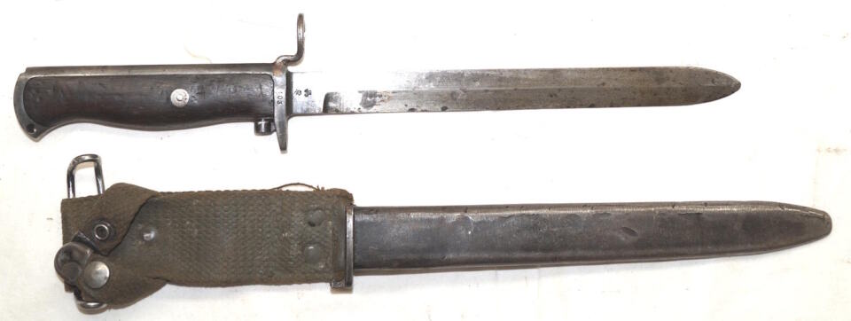 M1956 bayonet with scabbard and integral frog.