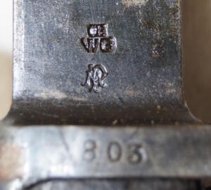 M1956 bayonet with scabbard and integral frog.
