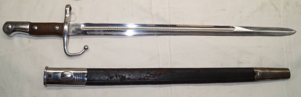 M1900 bayonet with matching scabbard.