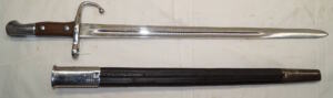 M1900 bayonet with matching scabbard.
