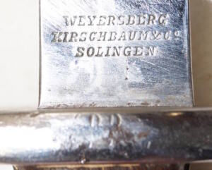 M1900 bayonet with matching scabbard.