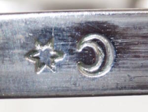 M1900 bayonet with matching scabbard.