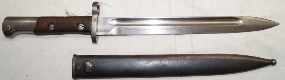 M1912 export bayonet with round button scabbard.