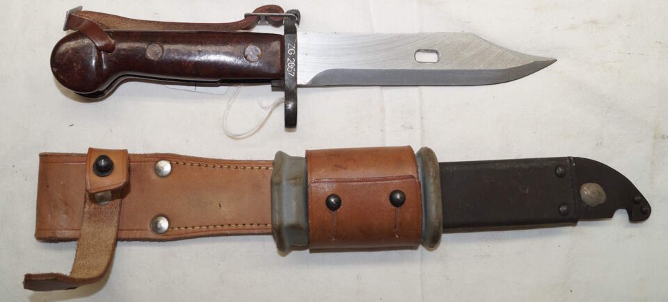 Romanian AKM sawback/wirecutter bayonet with MATCHING scabbard and frog + hand strap.