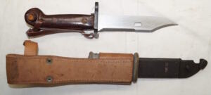 Romanian AKM sawback/wirecutter bayonet with MATCHING scabbard and frog + hand strap.