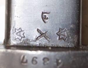 P1907 bayonet with almond stud scabbard.