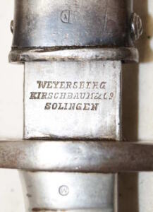 M1891 bayonet with matching scabbard.