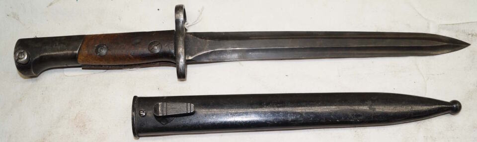 FN49 double edged bayonet with scabbard.