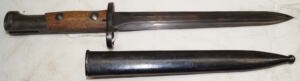 FN49 double edged bayonet with scabbard.