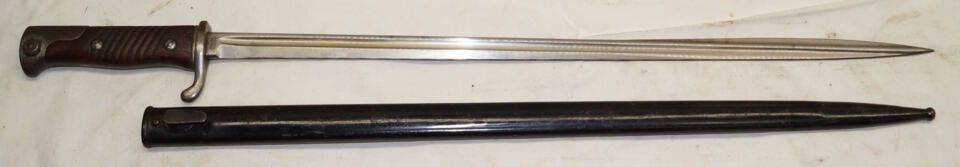 S98nA quillback bayonet with steel scabbard.