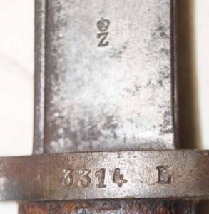 M1895 Artillery Carbine bayonet with partial scabbard.